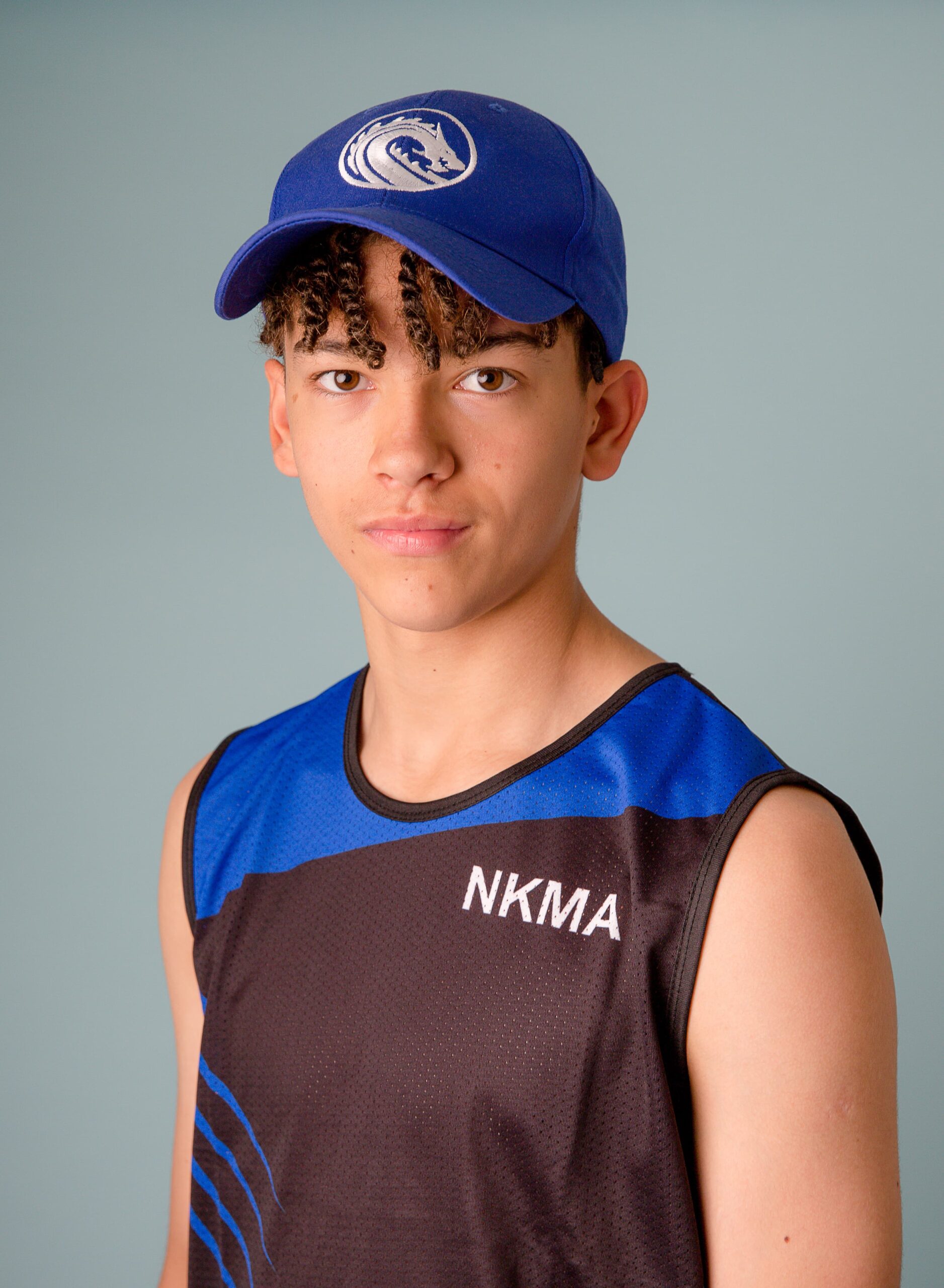 NKMA Blue Baseball Cap - Front Head shot of male model
