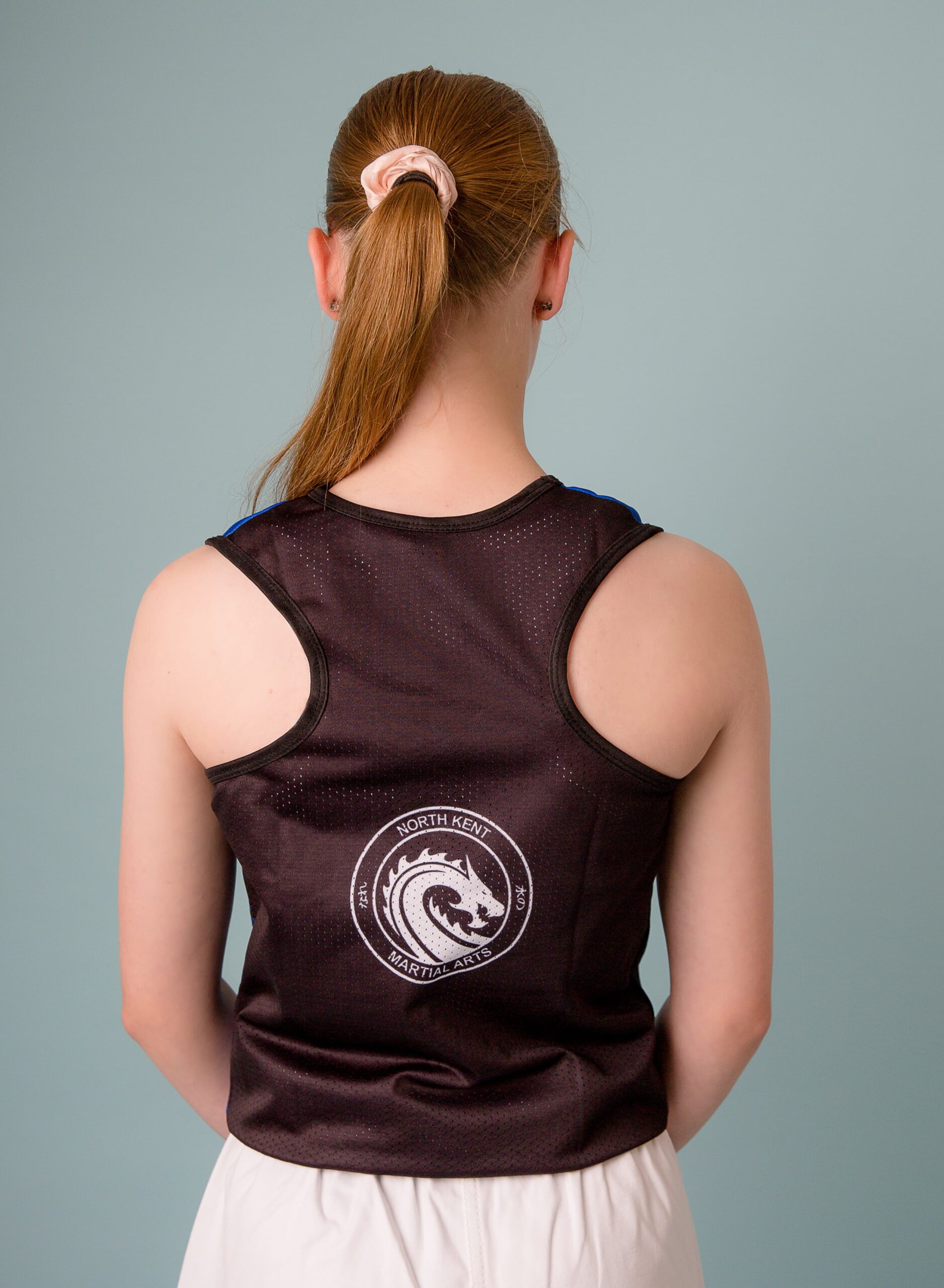 NKMA Ladies Girls Vest - Rear wide shot