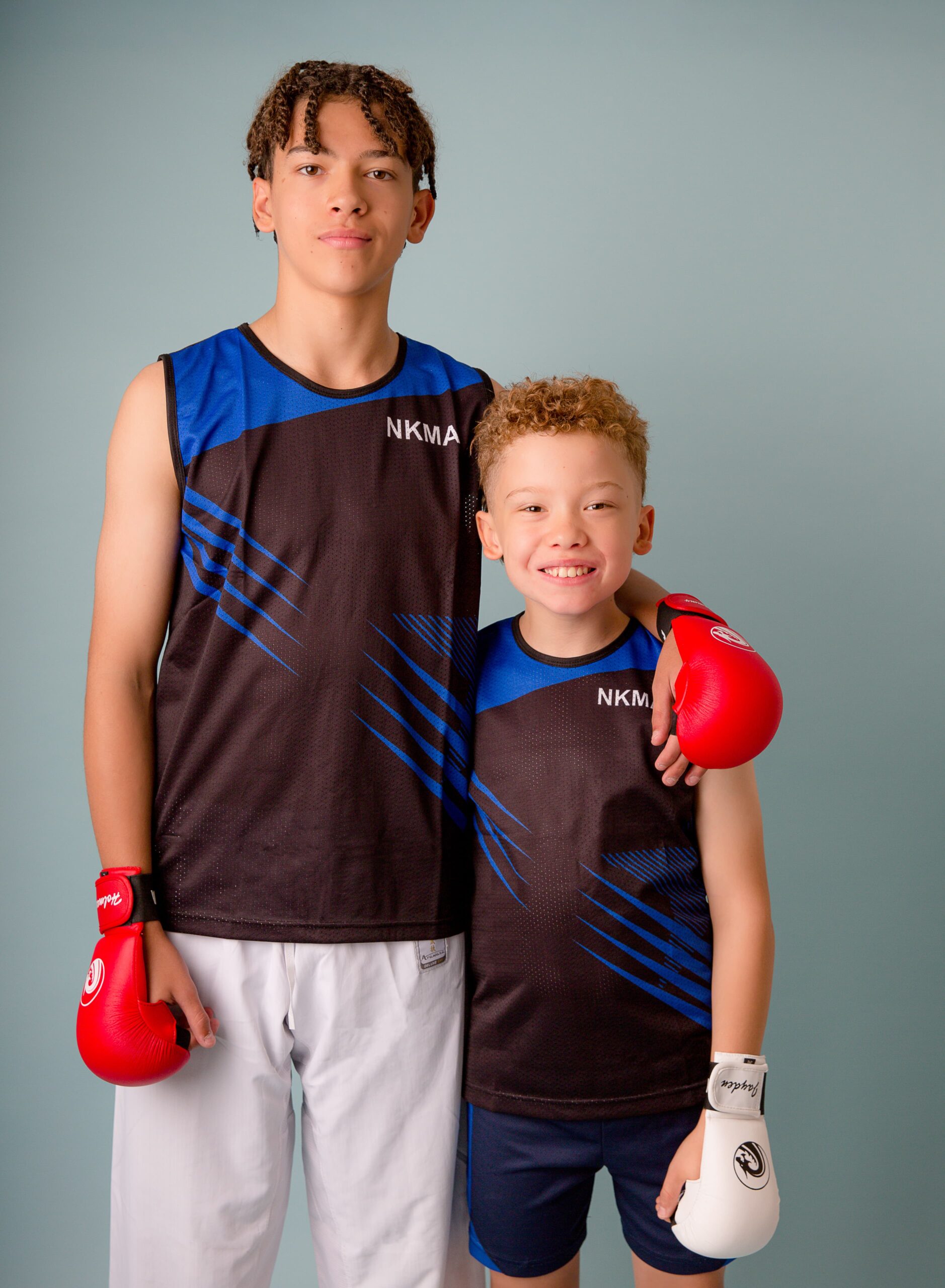 NKMA Men Boys Vest - Wide shot of 2 male models