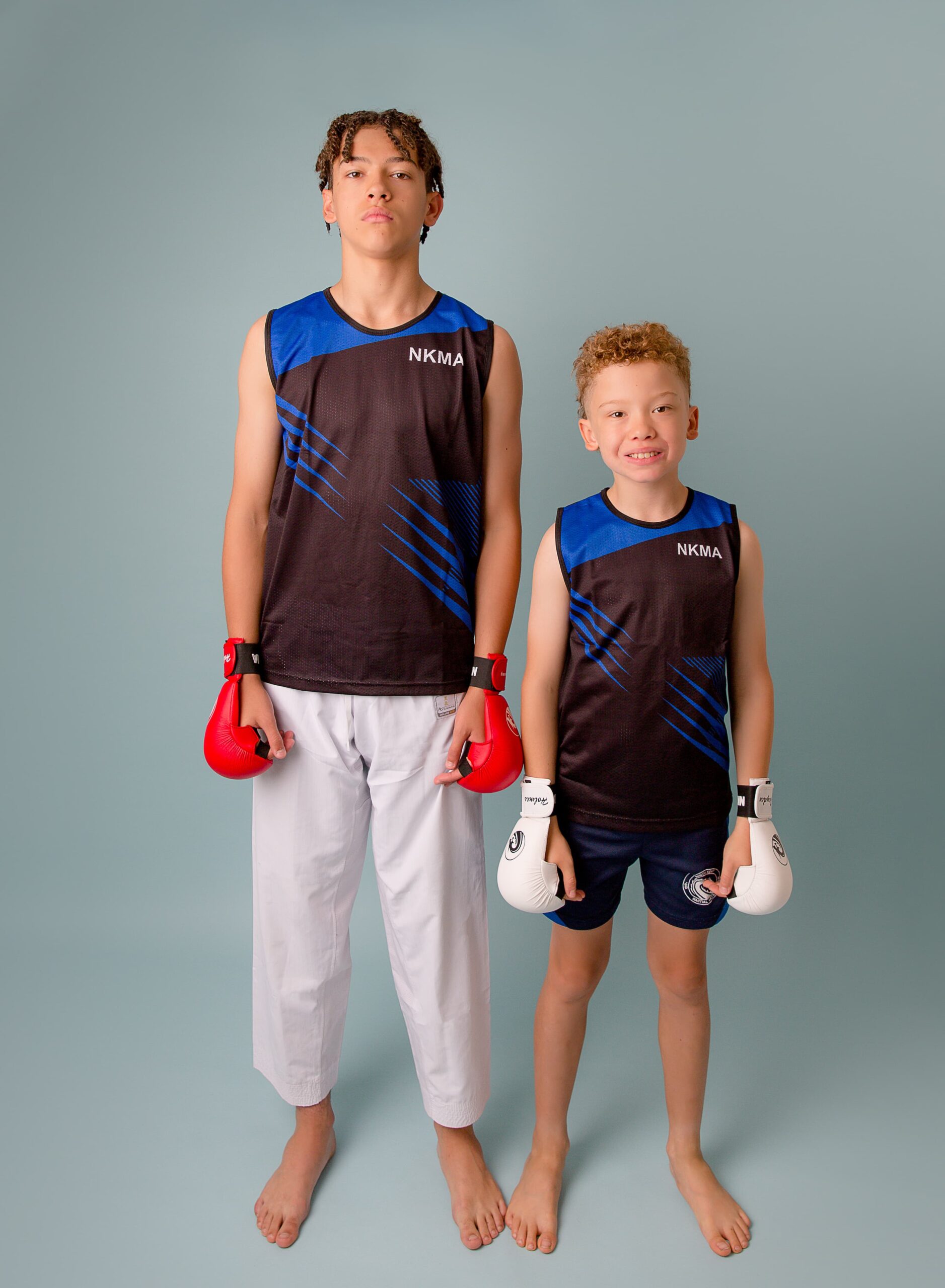 NKMA Men Boys Vest - wide shot of two male models